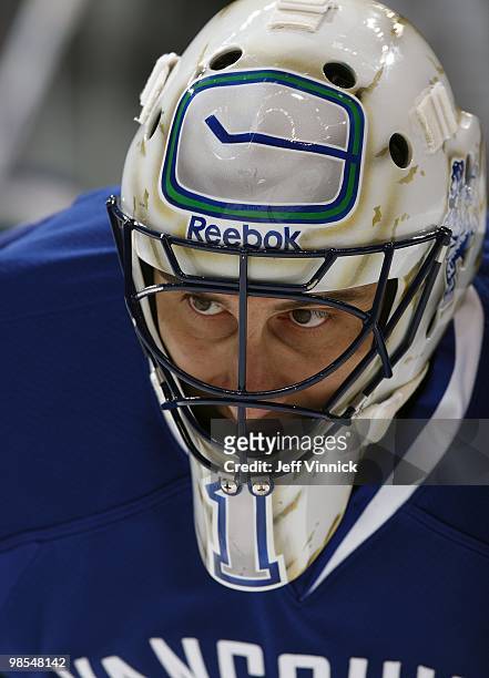 Roberto Luongo of the Vancouver Canucks stands in his crease in Game One of the Western Conference Quarterfinals against the Los Angeles Kings during...