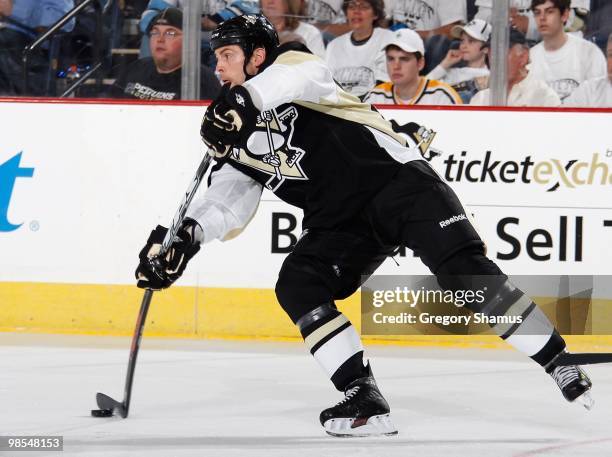 Craig Adams of the Pittsburgh Penguins makes a pass against the Ottawa Senators in Game One of the Eastern Conference Quarterfinals during the 2010...