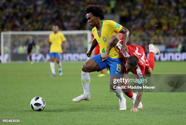 Aleksandar Kolarov of Serbia challenes Willian of Brazil during the 2018 FIFA World Cup Russia group E match between Serbia and Brazil at Spartak...