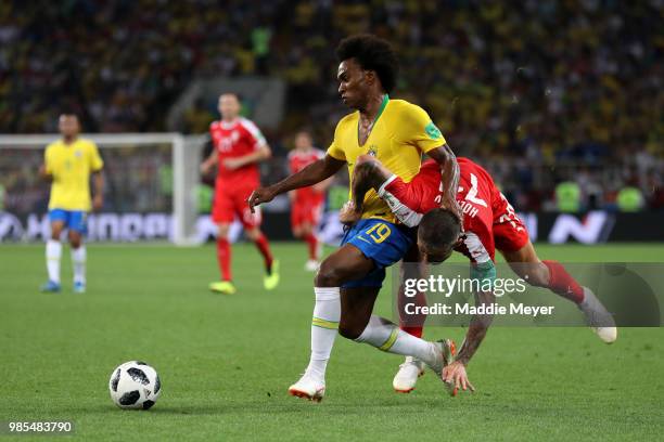 Aleksandar Kolarov of Serbia challenes Willian of Brazil during the 2018 FIFA World Cup Russia group E match between Serbia and Brazil at Spartak...