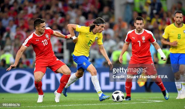 Filipe Luis of Brazil is challemged by Dusan Tadic of Serbia during the 2018 FIFA World Cup Russia group E match between Serbia and Brazil at Spartak...