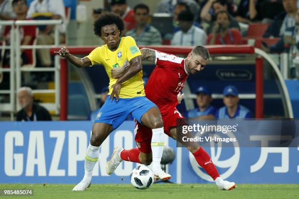 Willian of Brazil, Aleksander Kolarov of Serbia during the 2018 FIFA World Cup Russia group E match between Serbia and Brazil at the Otkrytiye Arena...