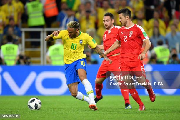 Neymar Jr of Brazil is challenged by Antonio Rukavina and Andrija Zivkovic of Serbia during the 2018 FIFA World Cup Russia group E match between...