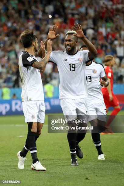 Bryan Ruiz of Costa Rica celebrates with teammate Kendall Waston after scoring a penalty for his team's second goal during the 2018 FIFA World Cup...