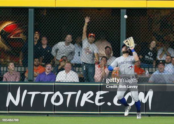 Kevin Pillar of the Toronto Blue Jays makes a catch on a deep fly ball off the bat of Jose Altuve of the Houston Astros in the fifth inning at Minute...