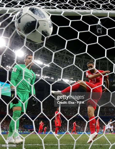 Ricardo Rodriguez of Switzerland kicks the ball into the back of the net in frustration after Switzerland concede a late penalty during the 2018 FIFA...