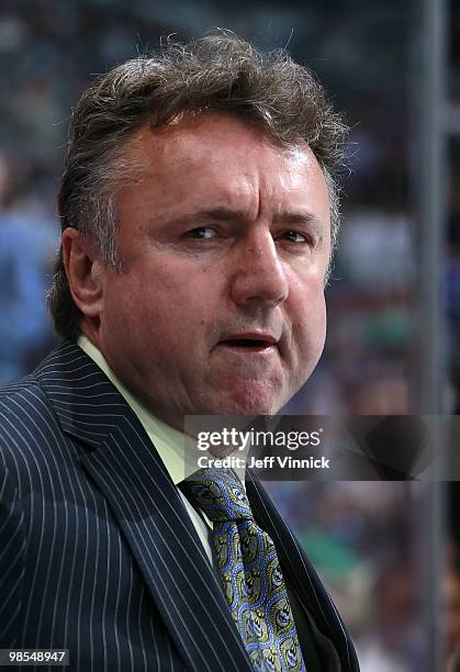 Associate coach Rick Bowness of the Vancouver Canucks looks on from the bench in Game One of the Western Conference Quarterfinals against the Los...