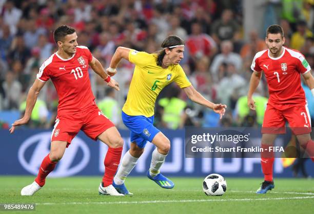 Filipe Luis of Brazil compete for the ball with Dusan Tadic of Serbia during the 2018 FIFA World Cup Russia group E match between Serbia and Brazil...