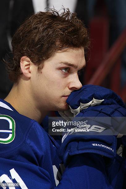Mason Raymond of the Vancouver Canucks looks on from the bench in Game One of the Western Conference Quarterfinals against the Los Angeles Kings...
