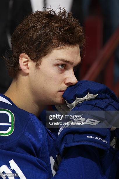 Mason Raymond of the Vancouver Canucks looks on from the bench in Game One of the Western Conference Quarterfinals against the Los Angeles Kings...