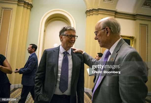 Bill Gates, billionaire and co-chair of the Bill and Melinda Gates Foundation, left, speaks with Senator Pat Roberts, a Republican from Kansas, ahead...