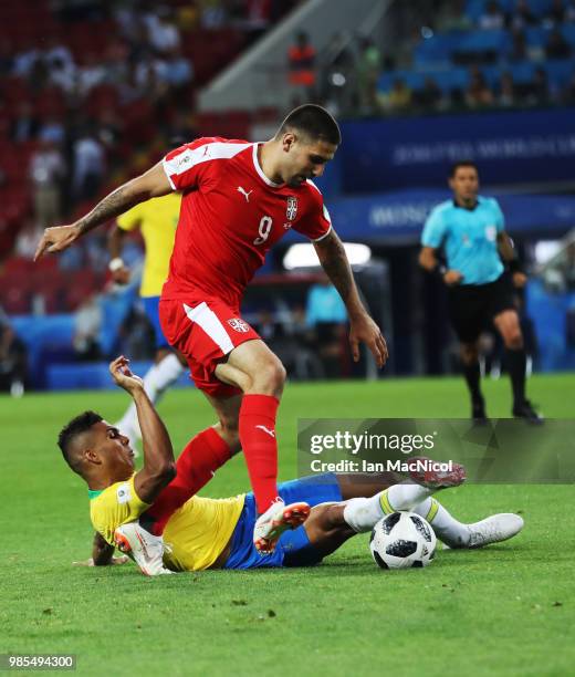 Casemiro of Brazil vies with Aleksandar Mitrovic of Serbia during the 2018 FIFA World Cup Russia group E match between Serbia and Brazil at Spartak...