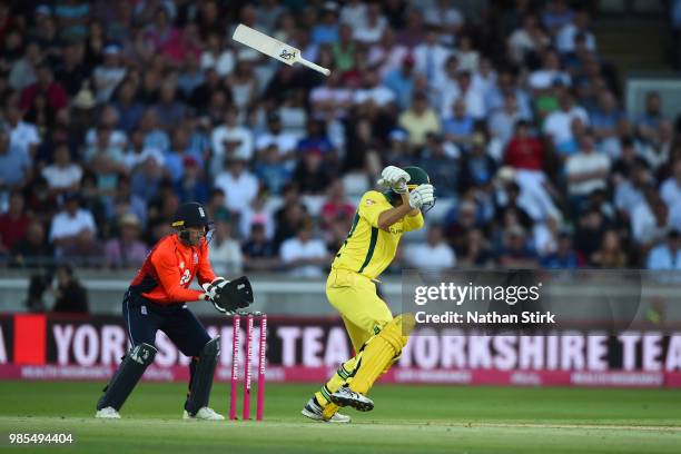 Ashton Agar of Austrlia lets go of his bat during the 1st Vitality International T20 match between England and Australia at Edgbaston on June 27,...