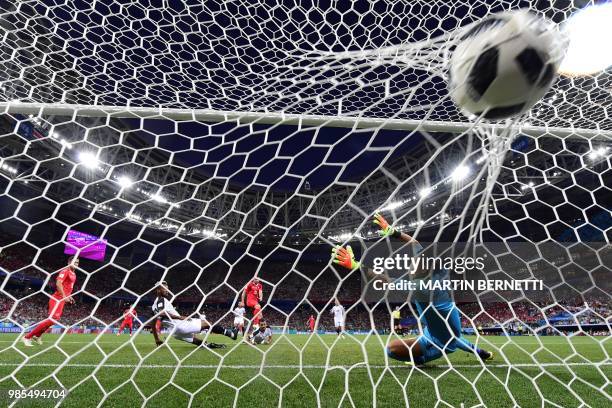 Switzerland's midfielder Blerim Dzemaili shoots and scores the opening goal past Costa Rica's goalkeeper Keylor Navas during the Russia 2018 World...