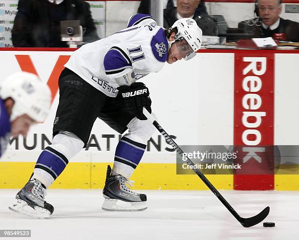 Anze Kopitar of the Los Angeles Kings skates up ice with the puck in Game Two of the Western Conference Quarterfinals against the Vancouver Canucks...