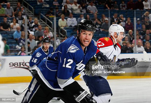 Ryan Malone of the Tampa Bay Lightning races to the puck against the Florida Panthers at the St. Pete Times Forum on April 10, 2010 in Tampa, Florida.