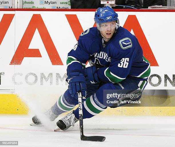 Jannik Hansen of the Vancouver Canucks skates up ice with the puck in Game Two of the Western Conference Quarterfinals against the Los Angeles Kings...