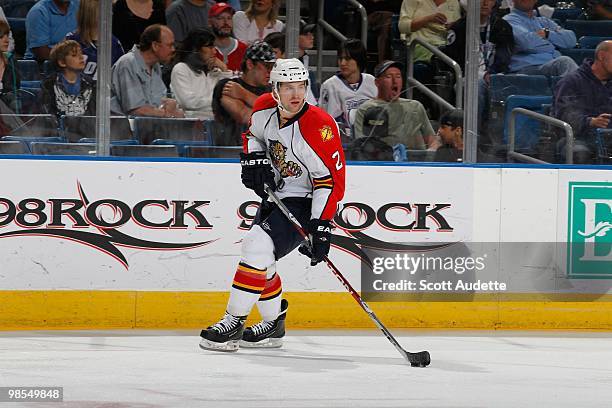 Keith Ballard of the Florida Panthers controls the puck against the Tampa Bay Lightning at the St. Pete Times Forum on April 10, 2010 in Tampa,...