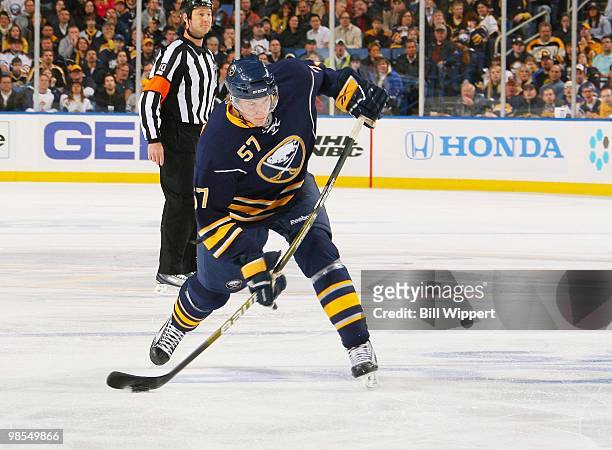 Tyler Myers of the Buffalo Sabres shoots the puck and scores a first period goal against the Boston Bruins in Game Two of the Eastern Conference...