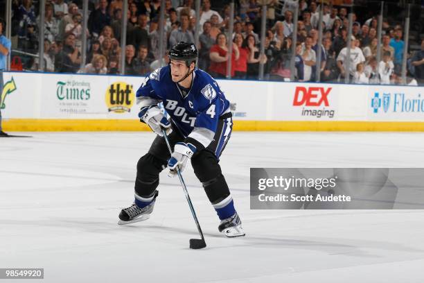 Vincent Lecavalier of the Tampa Bay Lightning skates with the puck against the Florida Panthers at the St. Pete Times Forum on April 10, 2010 in...