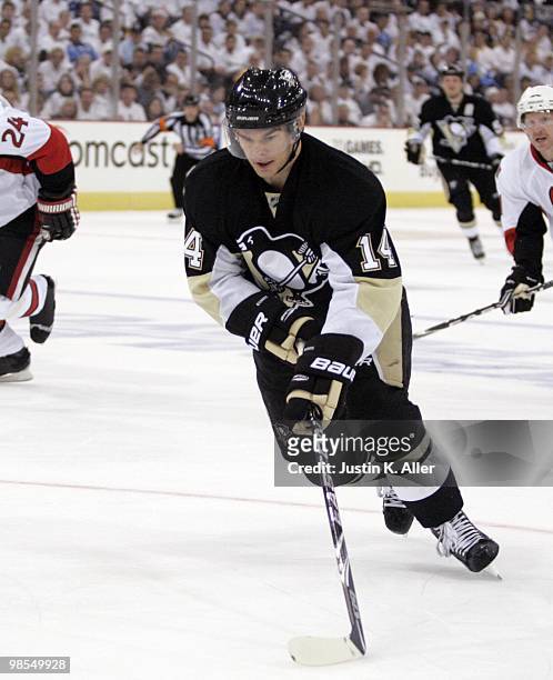Chris Kunitz of the Pittsburgh Penguins handles the puck against the Ottawa Senators in Game Two of the Eastern Conference Quarterfinals during the...