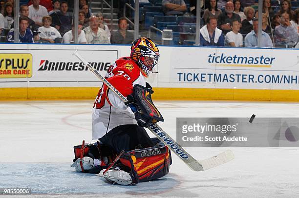 Goaltender Scott Clemmensen of the Florida Panthers makes a save against the Tampa Bay Lightning at the St. Pete Times Forum on April 10, 2010 in...