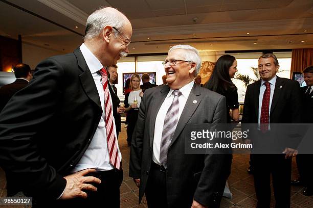 Theo Zwanziger , president of the German football association , welcomes Dieter Zetsche, CEO of German car maker Mercedes Benz, during a diner to...