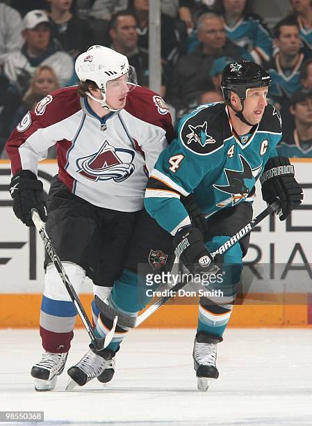 Matt Duchene of the Colorado Avalanche hustles toward the puck next to Rob Blake of the San Jose Sharks in Game One of the Western Conference...