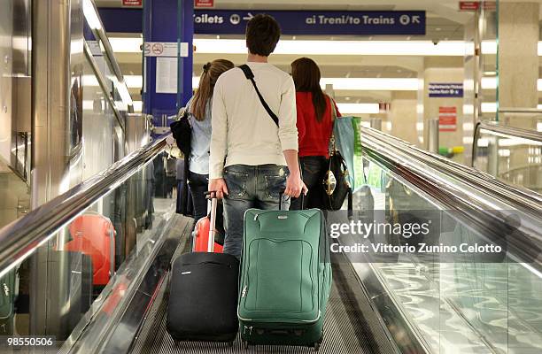 People walk in Milano Centrale train station on April 19, 2010 in Milan, Italy. Passengers are looking for alternative routes to return home after...