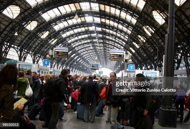 Passengers wait for a train to depart to Rome at Milano Centrale train station on April 19, 2010 in Milan, Italy. Passengers are looking for...
