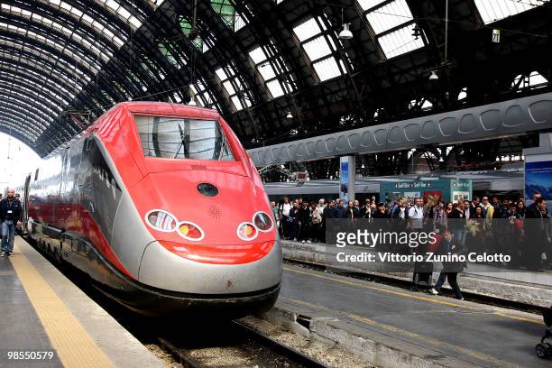 Passengers wait for a train to depart to Rome at Milano Centrale train station on April 19, 2010 in Milan, Italy. Passengers are looking for...