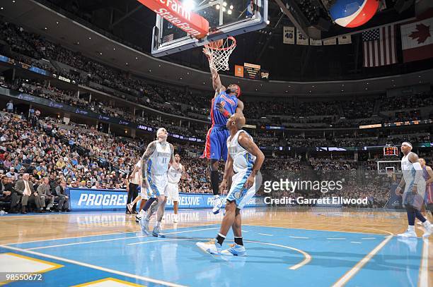 Ben Wallace of the Detroit Pistons puts a shot up against Chauncey Billups of the Denver Nuggets on February 26, 2010 at the Pepsi Center in Denver,...