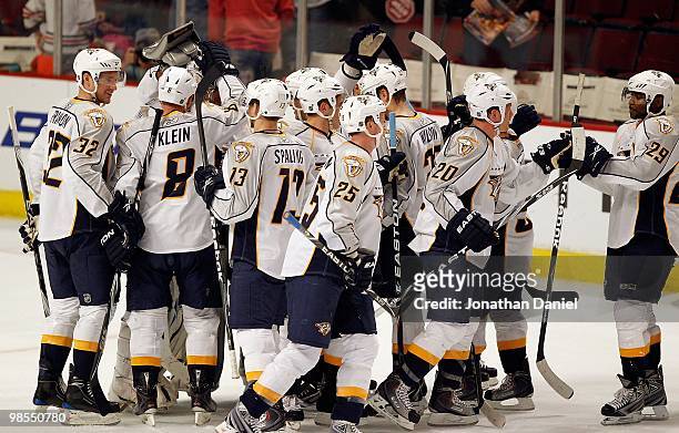 Members of the Nashville Predators including Cody Franson, Kevin Klein, Nick Spaling and Jerred Smithson, Ryan Suter and Joel Ward celebrate a win...