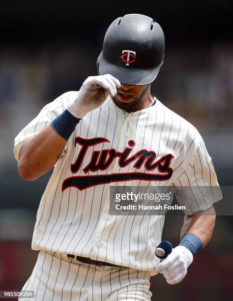 Eddie Rosario of the Minnesota Twins rounds the bases after hitting a home run against the Texas Rangers during the game on June 23, 2018 at Target...