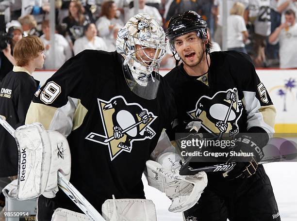 Kris Letang of the Pittsburgh Penguins talks with Marc-Andre Fleury against the Ottawa Senators in Game Two of the Eastern Conference Quarterfinals...