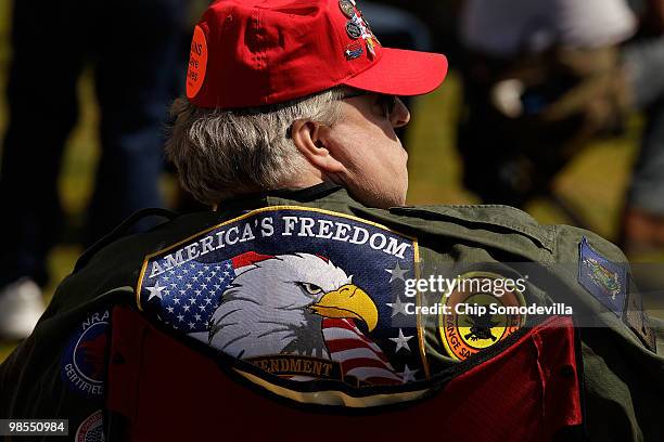 Organized by the Second Amendment March group, about 500 pro-gun demonstrators rally near the Washington Monument April 19, 2010 in Washington, DC....