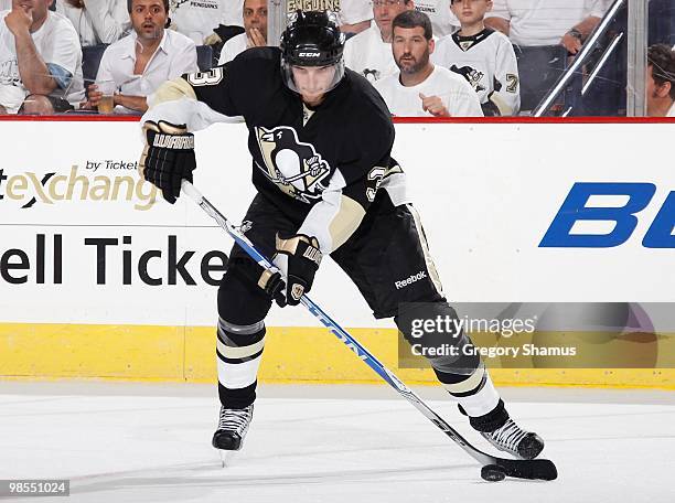 Alex Goligoski of the Pittsburgh Penguins controls the puck against the Ottawa Senators in Game Two of the Eastern Conference Quarterfinals during...