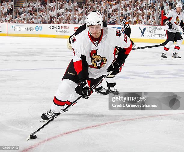 Jason Spezza of the Ottawa Senators moves the puck against the Pittsburgh Penguins in Game Two of the Eastern Conference Quarterfinals during the...