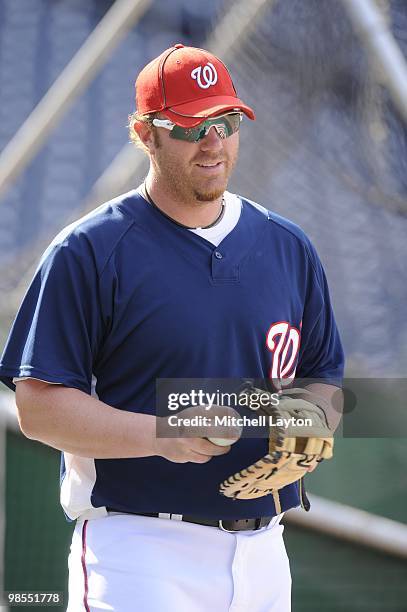 Adam Dunn of the Washington Nationals looks on before a baseball game against the Milwaukee Brewers on April16, 2010 at Nationals Park in Washington,...