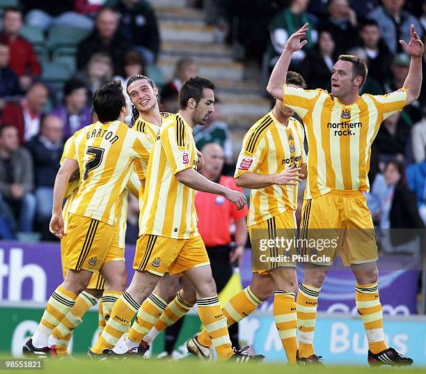 Andrew Carroll of Newcastle United second from left celabrates scoring during the Coca Cola Championship match between Plymouth Argyle and Newcastle...