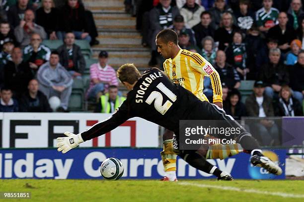 Wayne Routledge of Newcastle United goes round David Stockdale of Plymouth Argyle to score during the Coca Cola Championship match between Plymouth...