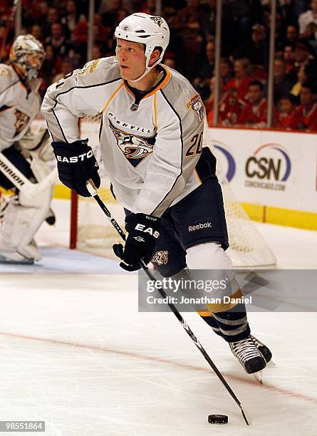 Ryan Suter of the Nashville Predators controls the puck in front of teammate Pekka Rinne against the Chicago Blackhawks in Game One of the Western...