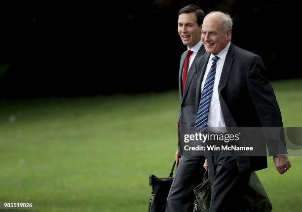 White House Chief of Staff John Kelly and senior advisor Jared Kushner depart the White House while accompanying U.S. President Donald Trump June 27,...