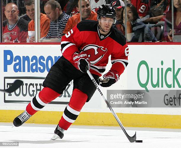 Andy Greene of the New Jersey Devils plays the puck against the Philadelphia Flyers in Game Two of the Eastern Conference Quarterfinals during the...