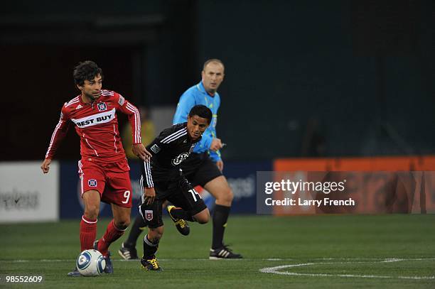 Baggio Husidic of Chicago Fire dribbles the ball past Andy Najar of D.C. United at RFK Stadium on April 17, 2010 in Washington, DC. The Fire defeated...