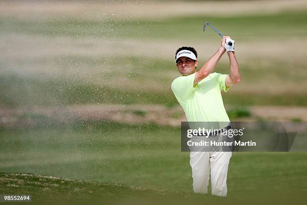 Jason Enloe hits his shot during the third round of the Chitimacha Louisiana Open at Le Triomphe Country Club on March 27, 2010 in Broussard,...