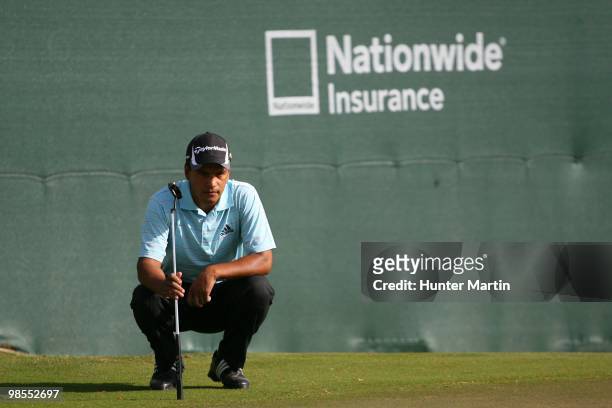 Fabian Gomez lines up a putt during the final round of the Chitimacha Louisiana Open at Le Triomphe Country Club on March 28, 2010 in Broussard,...