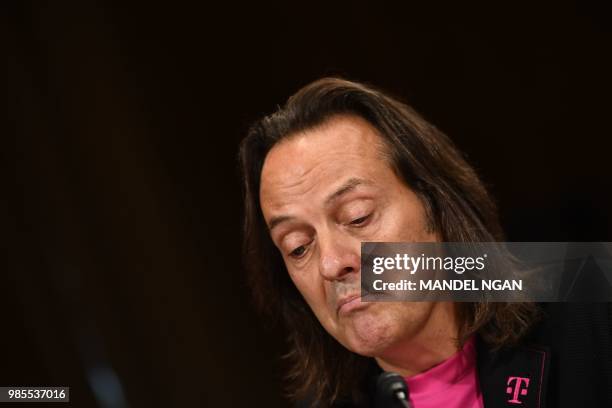 Mobile CEO John Legere gives testimony at the Senate Judiciary Committee's Subcommittee on Antitrust, Competition Policy and Consumer Rights hearing...