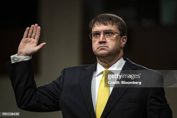 Robert Wilkie, secretary of Veterans Affairs nominee for U.S. President Donald Trump, swears in during a confirmation hearing before the Senate...
