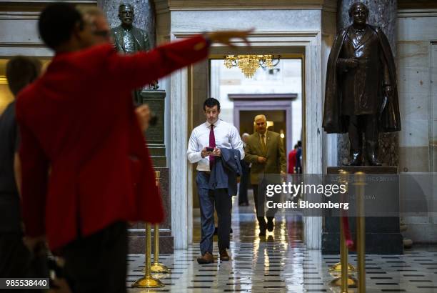 Representative Trey Hollingsworth, a Republican from Indiana, center, walks to the House floor on Wednesday, June 27, 2018. The Department of...